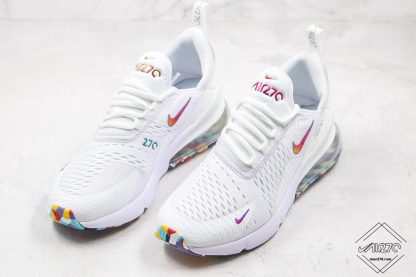 white colorful nike shoes
